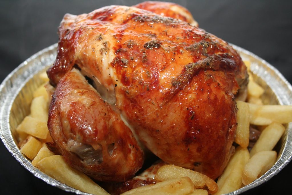origen del pollo asado